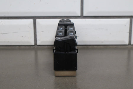 2003-2007 Hummer H2 - Left Front Window Switch W/ Bezel Ebony