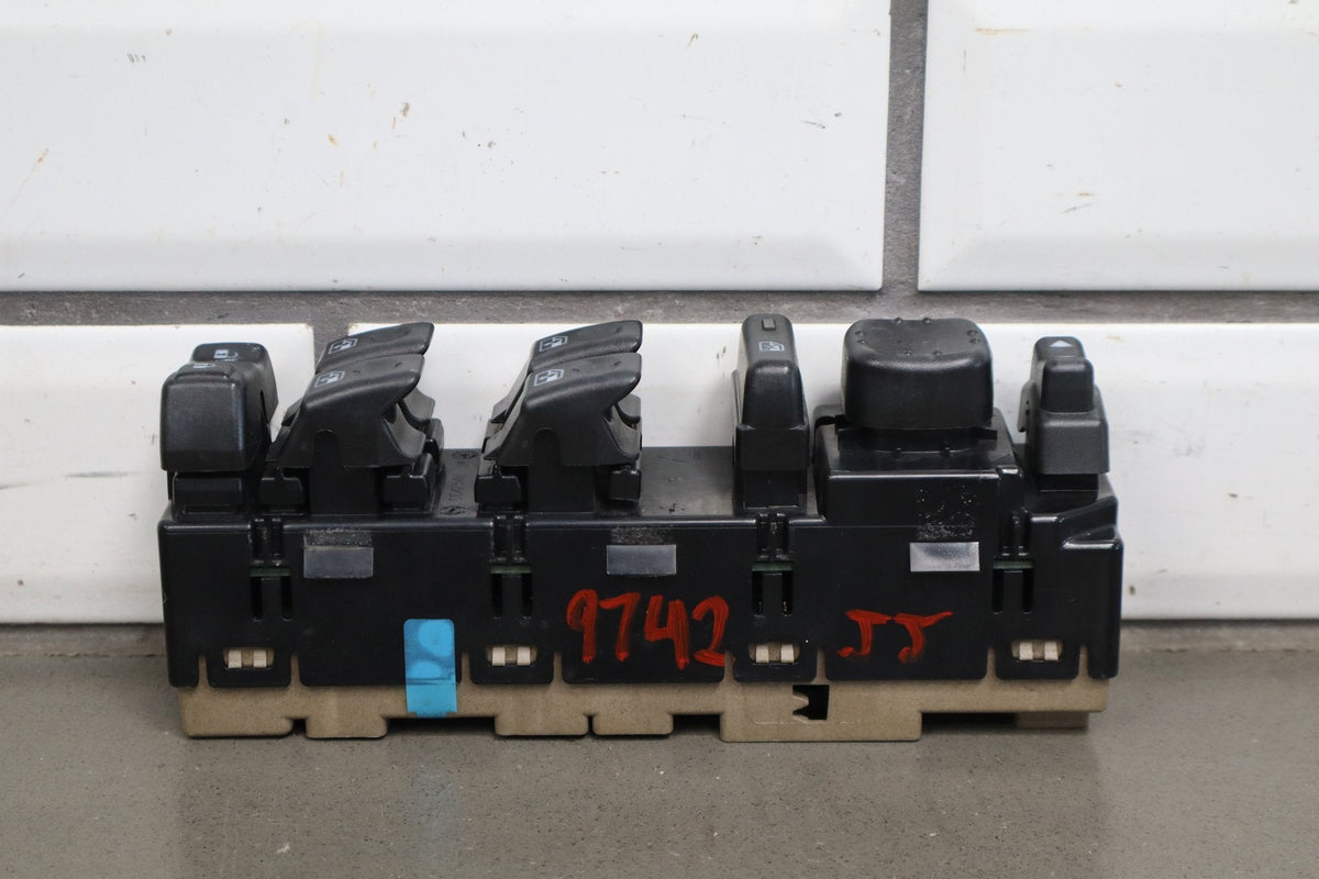 2003-2007 Hummer H2 - Left Front Window Switch W/ Bezel Ebony