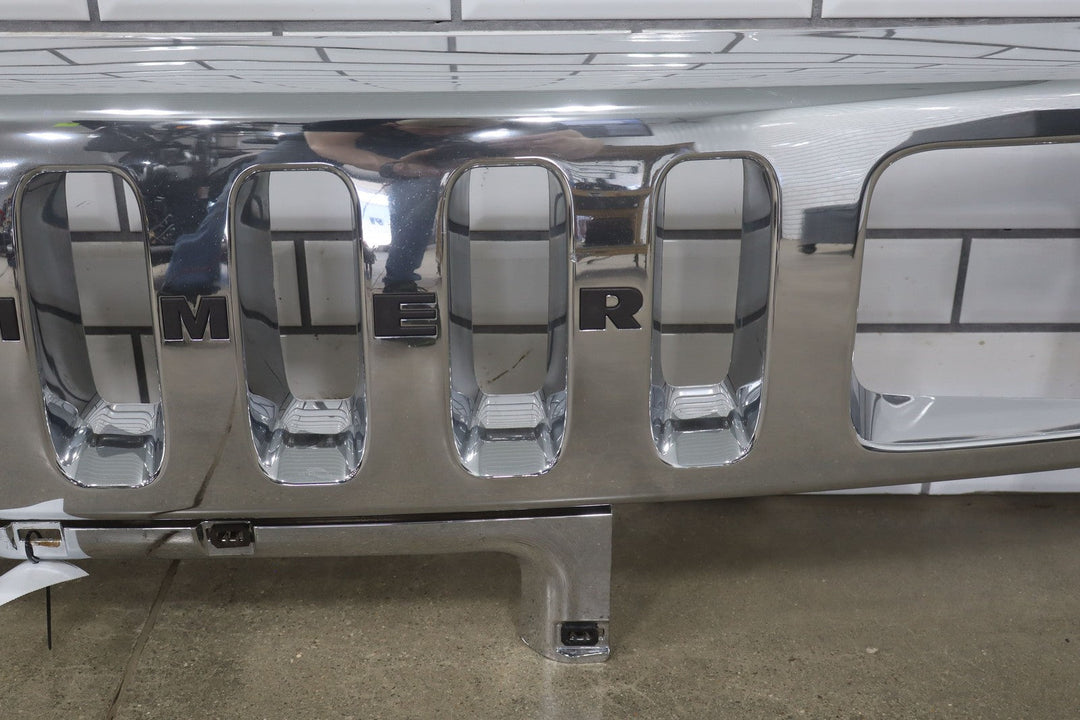 2003 - 2007 Hummer H2 OEM Upper Headlight Bumper Chrome Grille *1 Broken Tab*