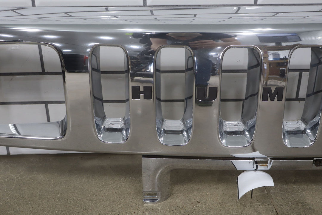 2003 - 2007 Hummer H2 OEM Upper Headlight Bumper Chrome Grille *1 Broken Tab*