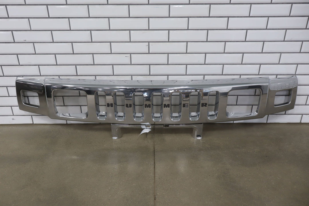 2003 - 2007 Hummer H2 OEM Upper Headlight Bumper Chrome Grille *1 Broken Tab*