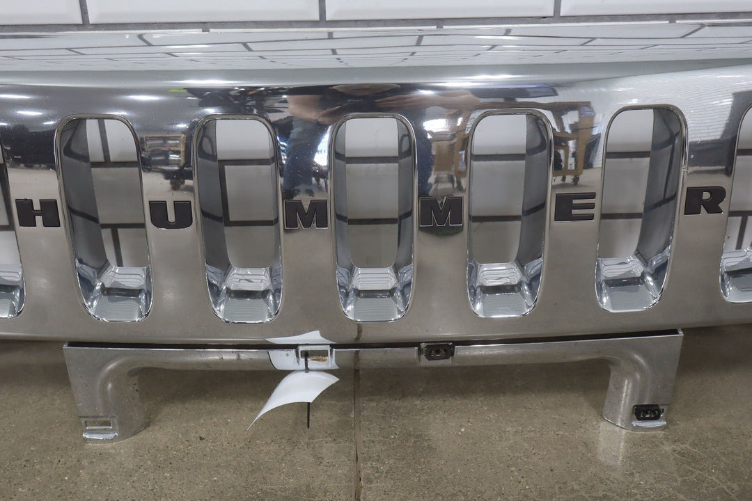2003 - 2007 Hummer H2 OEM Upper Headlight Bumper Chrome Grille *1 Broken Tab*