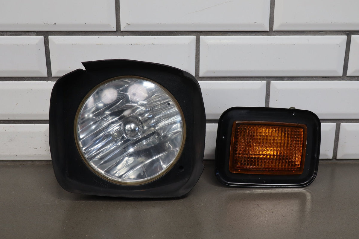 2003-2009 Hummer H2 Left Headlamp W/ Amber Marker Lamp 20821229