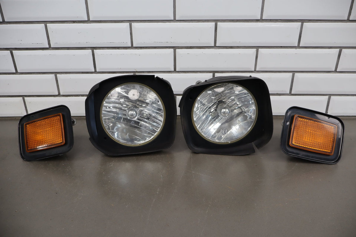 2003-2009 Hummer H2 OEM Headlamps W/ Amber Marker Lamps