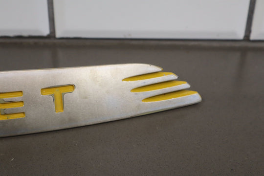 2004 - 2006 Chevy SSR OEM Satin Nose Trim Emblem W/Yellow Letters