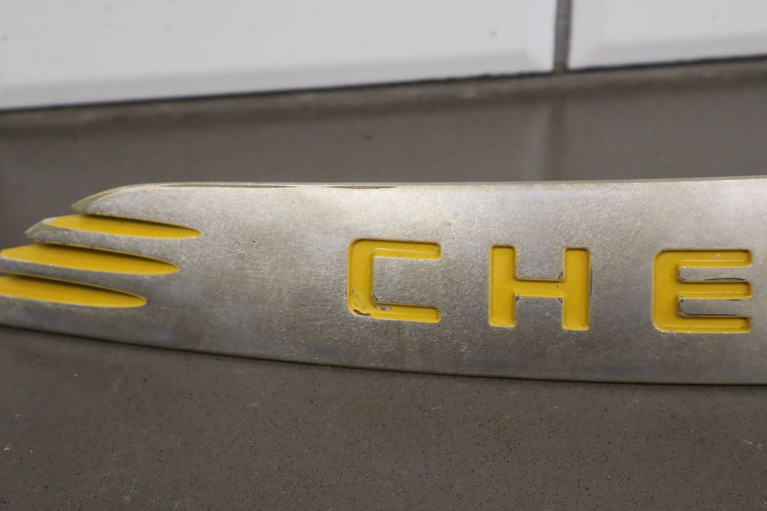 2004 - 2006 Chevy SSR OEM Satin Nose Trim Emblem W/Yellow Letters