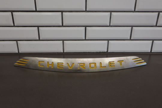 2004 - 2006 Chevy SSR OEM Satin Nose Trim Emblem W/Yellow Letters