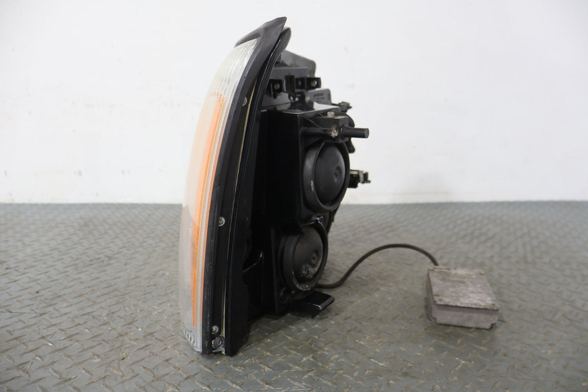 2004 Cadillac Escalade- HEADLAMP ASSEMBLY