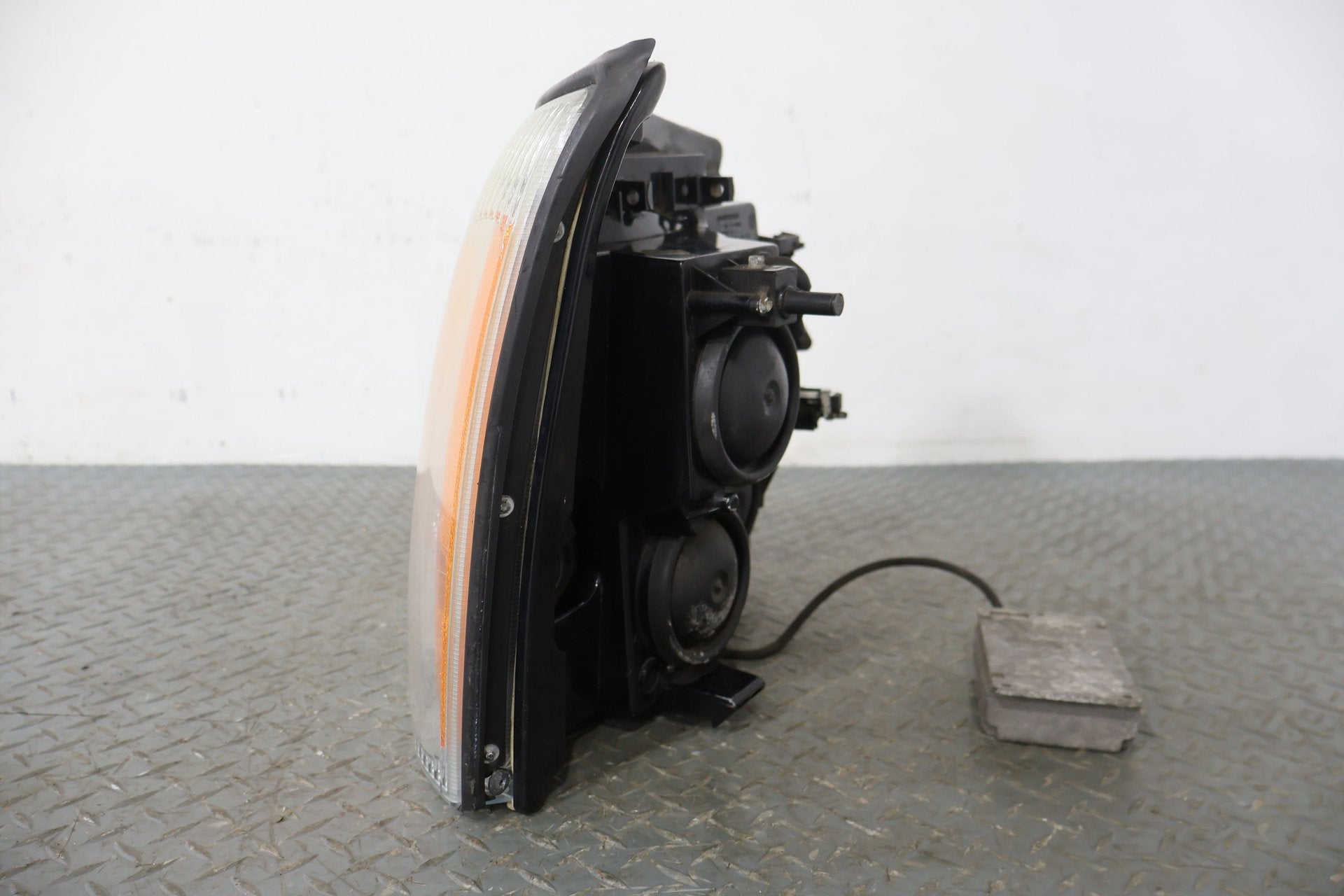 2004 Cadillac Escalade- HEADLAMP ASSEMBLY