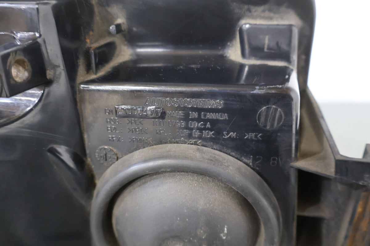 2004 Cadillac Escalade- HEADLAMP ASSEMBLY