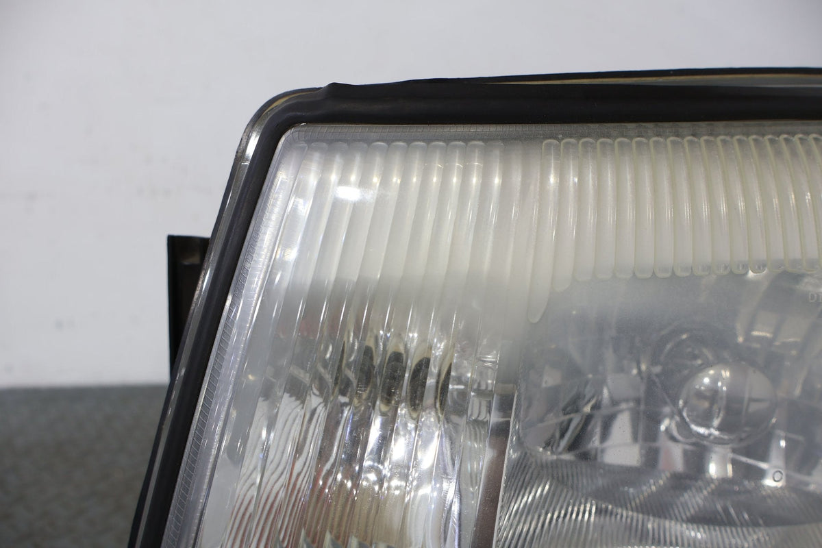 2004 Cadillac Escalade- HEADLAMP ASSEMBLY