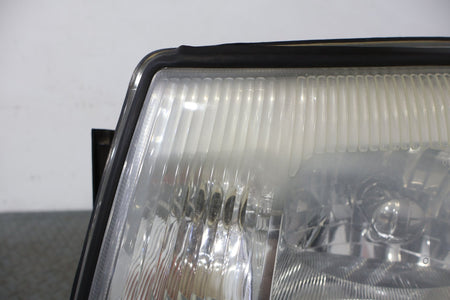 2004 Cadillac Escalade- HEADLAMP ASSEMBLY