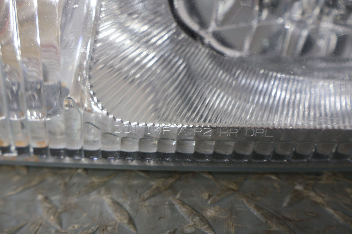 2004 Cadillac Escalade- HEADLAMP ASSEMBLY