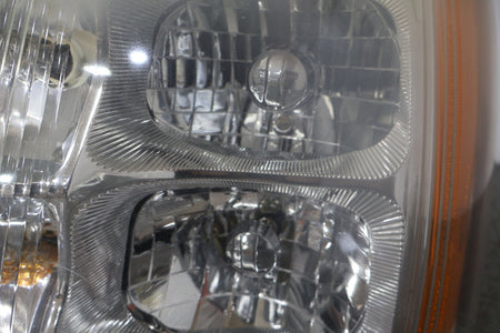 2004 Cadillac Escalade- HEADLAMP ASSEMBLY