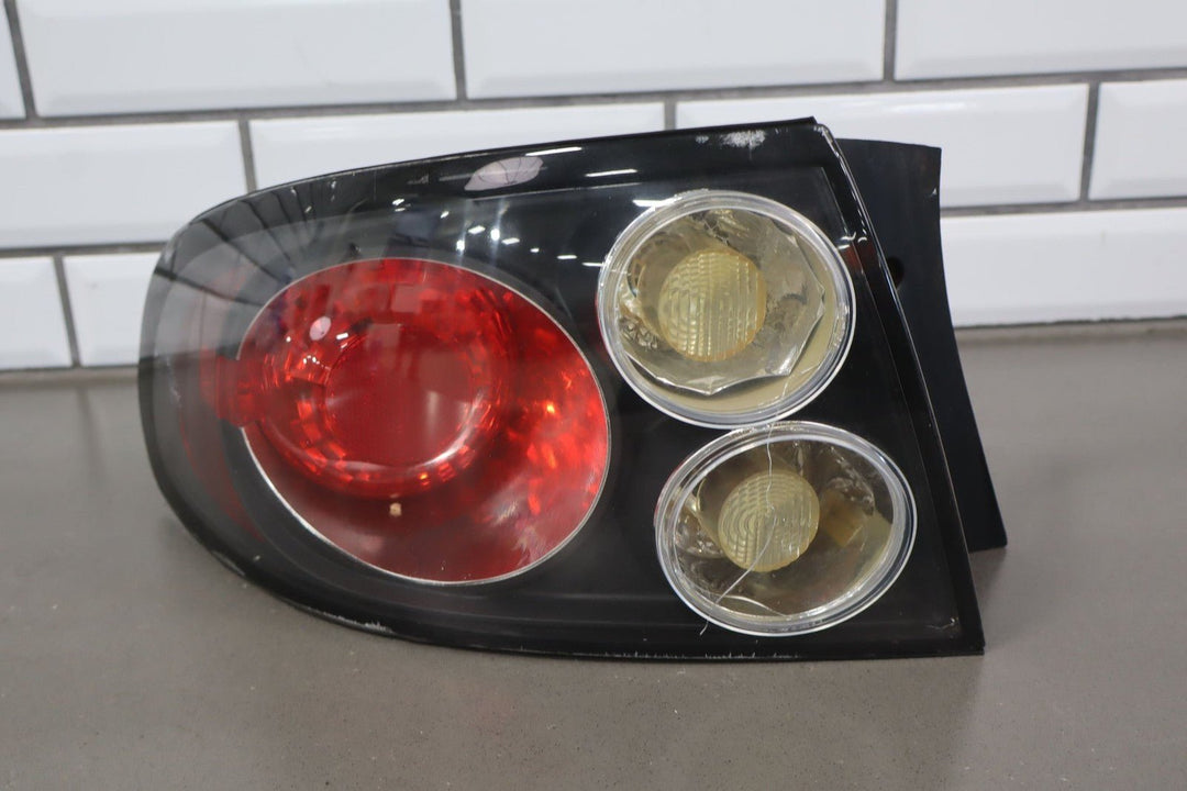 2005 - 2006 Pontiac GTO Left Tail Light 92146794 OEM *Heat Cracking*