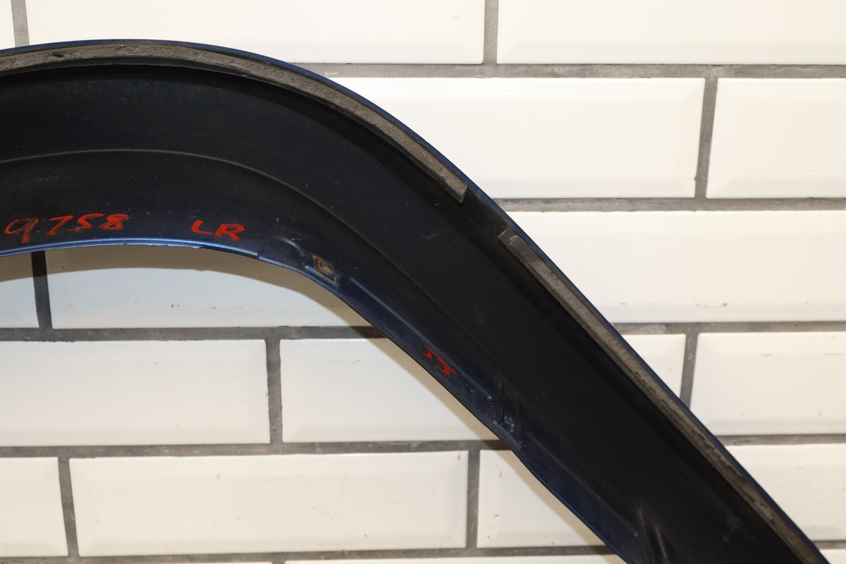 2006 Hummer H2 Left Rear Wheel Arch Moulding Pacific Blue 91