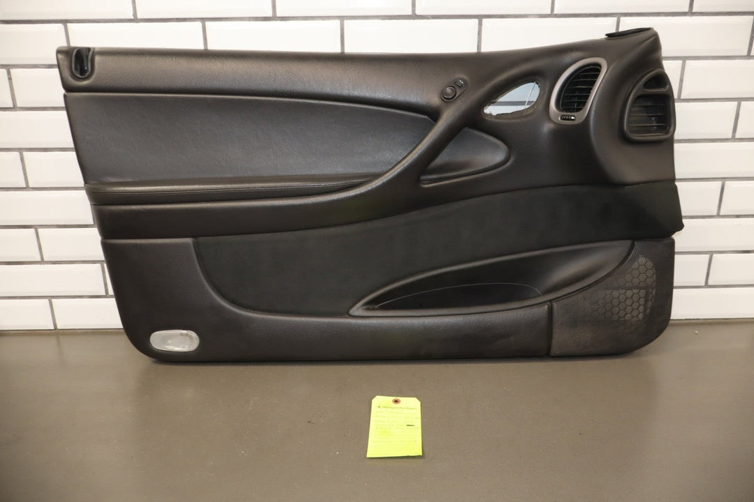 2006 Pontiac GTO Left Front Door Trim Panel BLACK 812