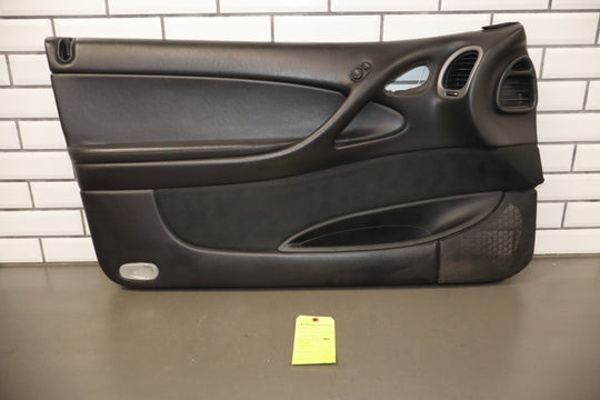 2006 Pontiac GTO Left Front Door Trim Panel BLACK 812