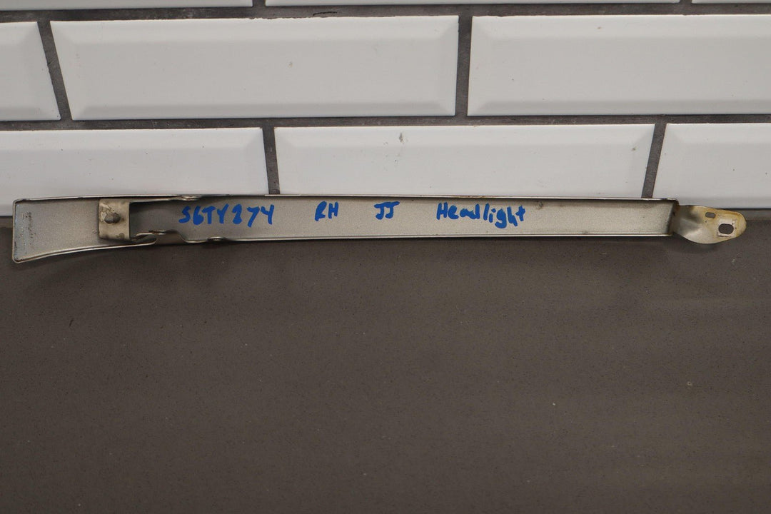 2006 Toyota Land Cruiser Front Lower Metal Headlight Filler Panels *Sonora Gold*