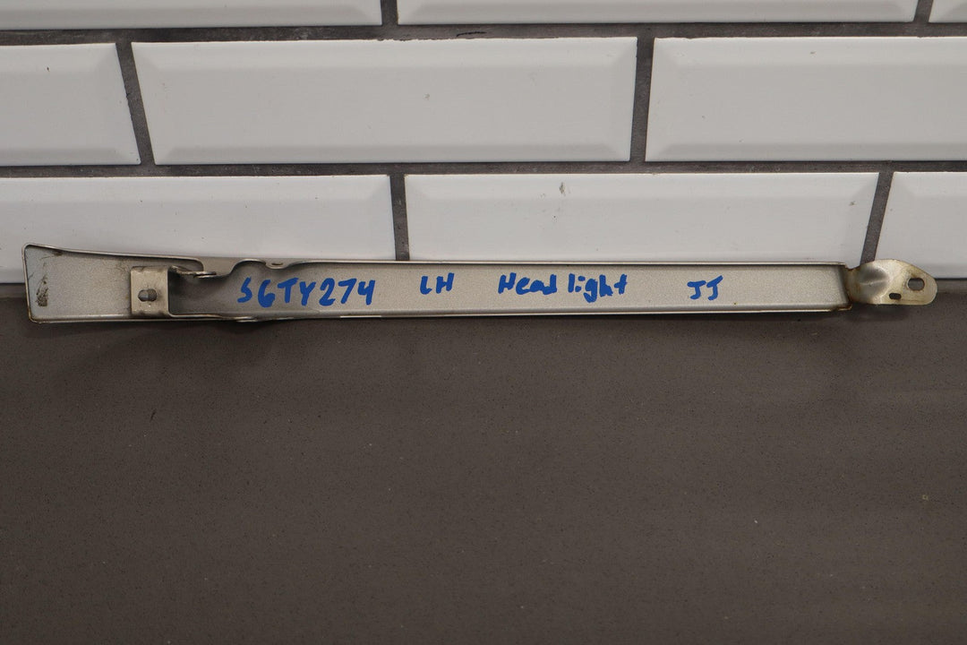 2006 Toyota Land Cruiser Front Lower Metal Headlight Filler Panels *Sonora Gold*