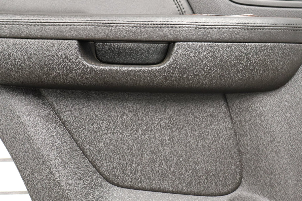 2007-2009 GMC Yukon LH Rear Door Panel Ebony 194 Leather