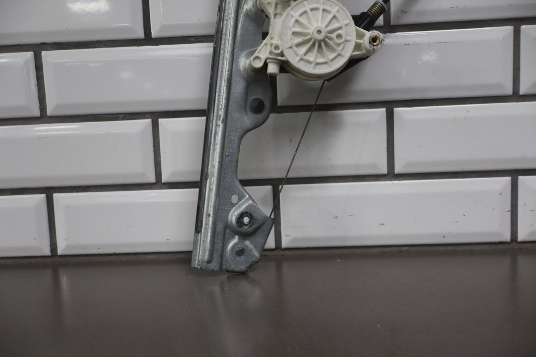 2007 - 2014 Chevrolet Suburban Left Front Door Regulator 20945138 OEM