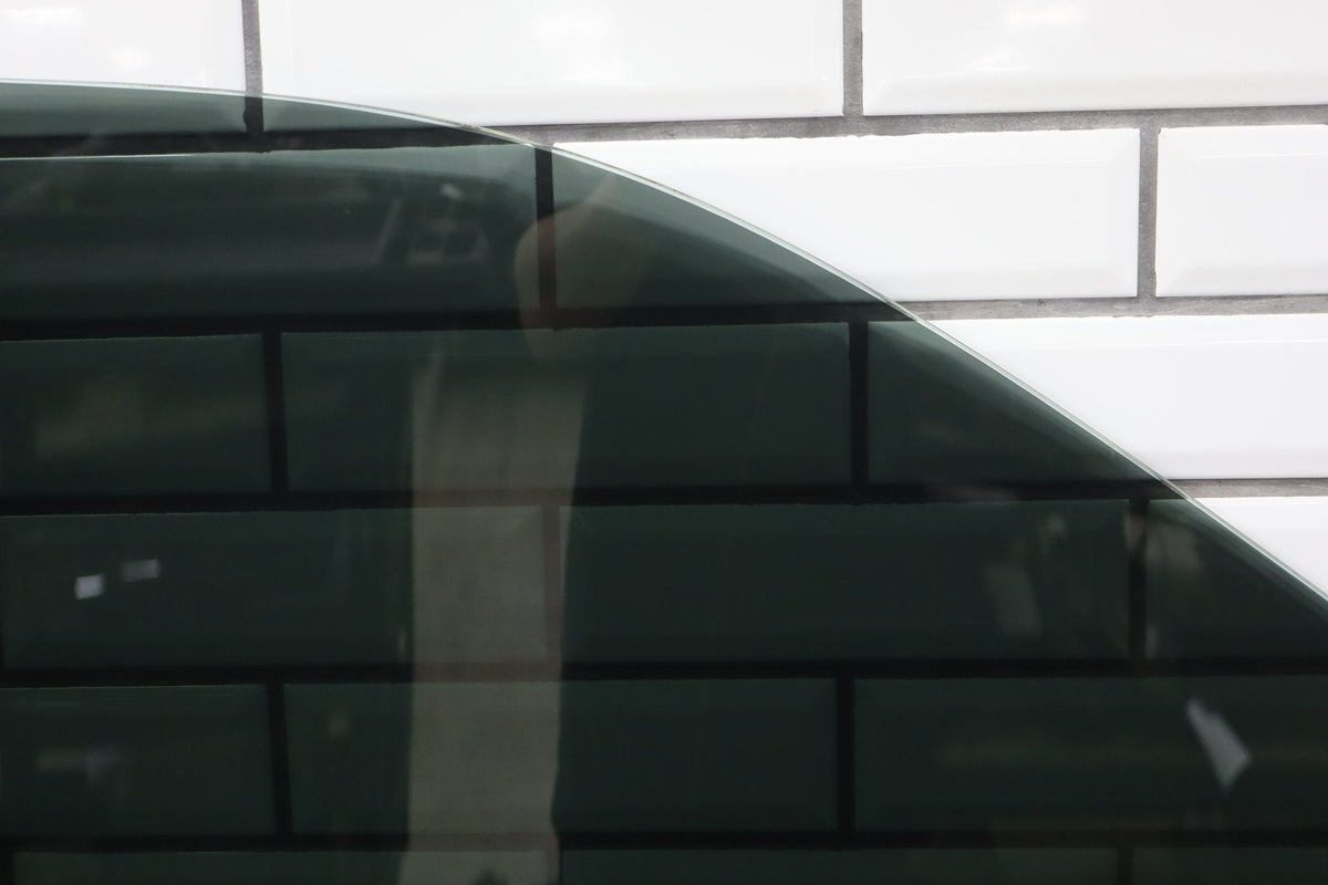 2009-2018 Ram Left Front Door Window 55112391AB OEM