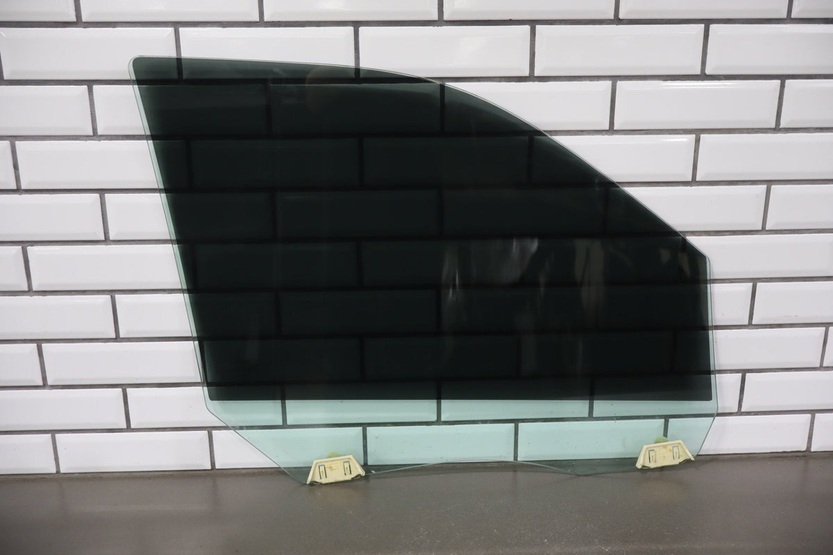2009-2018 Ram Left Front Door Window 55112391AB OEM