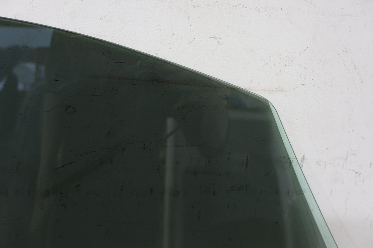 2010 ASTON- Left Front Door Window