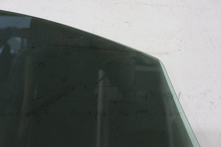 2010 ASTON- Left Front Door Window