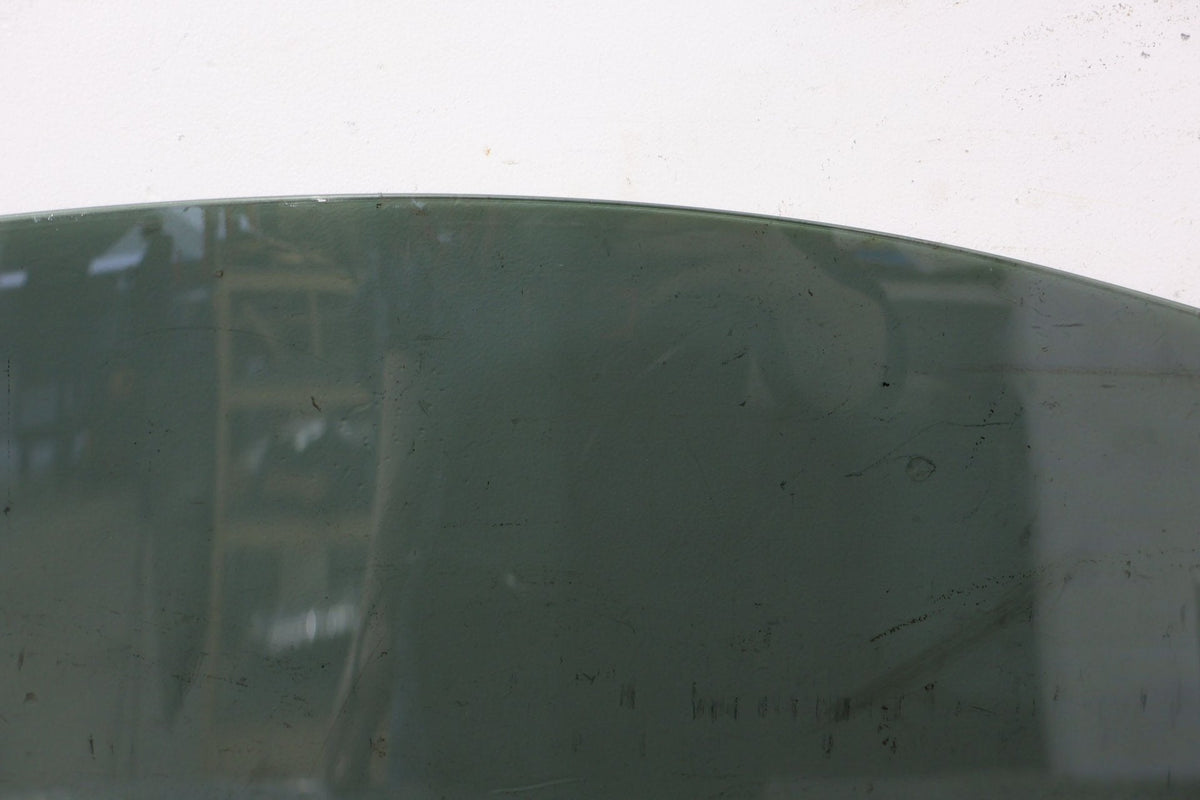 2010 ASTON- Left Front Door Window