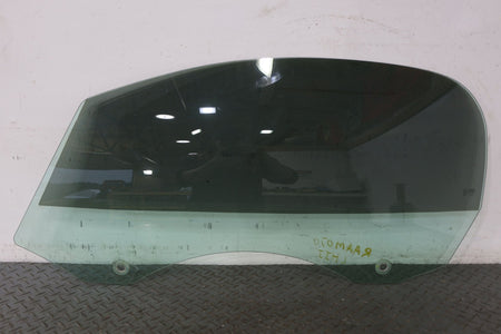 2010 ASTON- Left Front Door Window