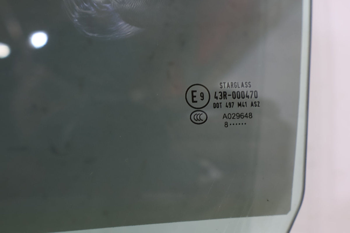 2010 ASTON- Left Front Door Window