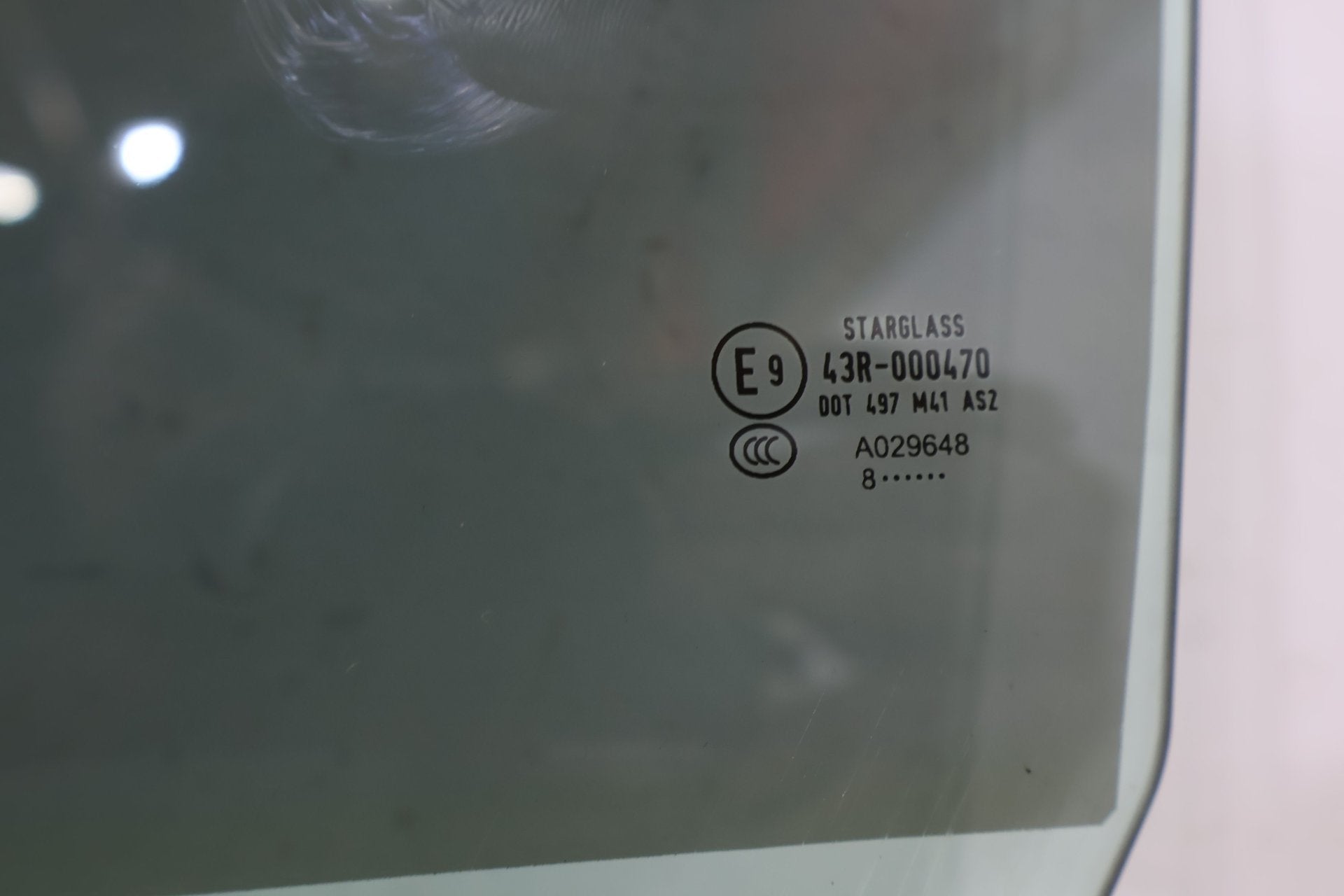 2010 ASTON- Left Front Door Window