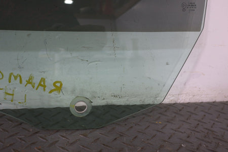 2010 ASTON- Left Front Door Window