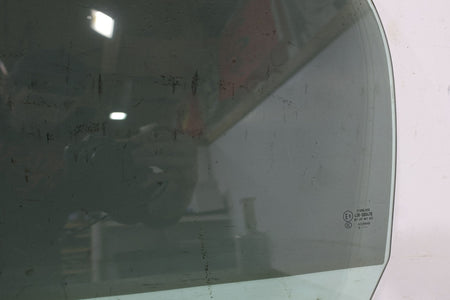 2010 ASTON- Left Front Door Window