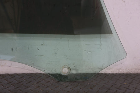 2010 ASTON- Left Front Door Window