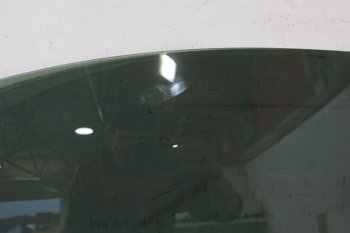 2010 ASTON- Left Front Door Window