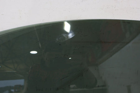 2010 ASTON- Left Front Door Window