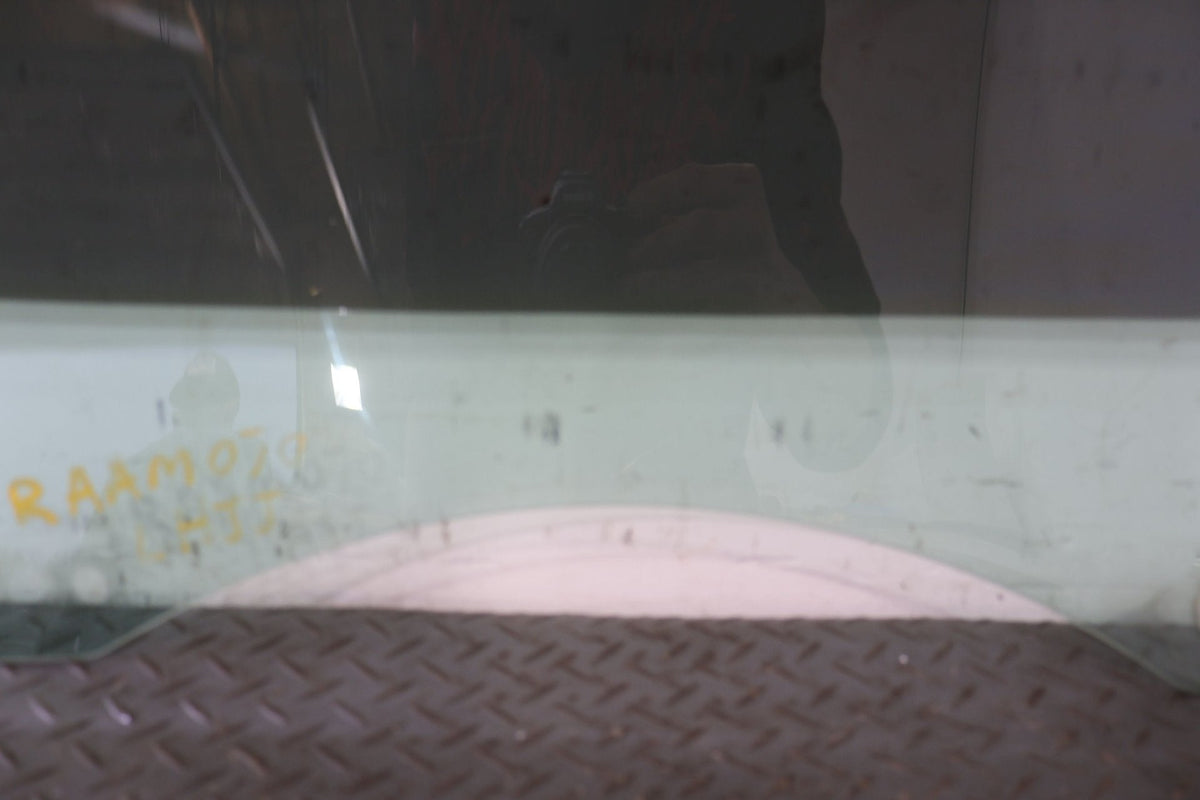 2010 ASTON- Left Front Door Window