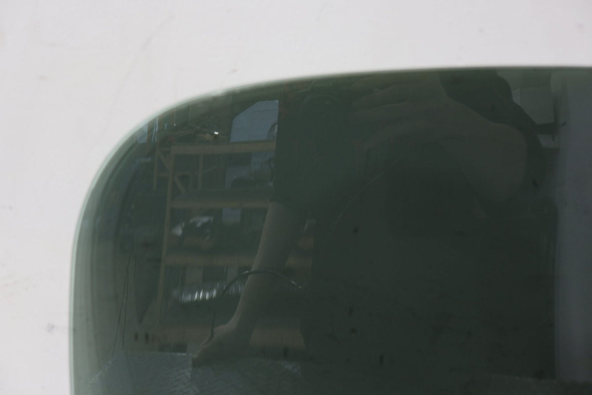 2010 ASTON- Left Front Door Window