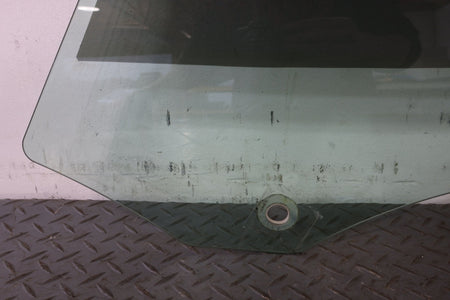 2010 ASTON- Left Front Door Window