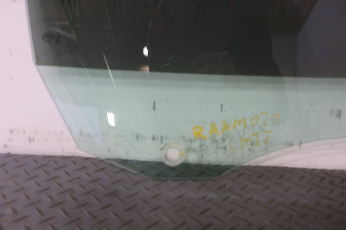 2010 ASTON- Left Front Door Window