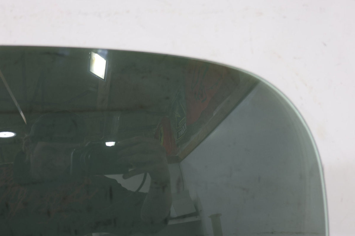 2010 ASTON- Left Front Door Window