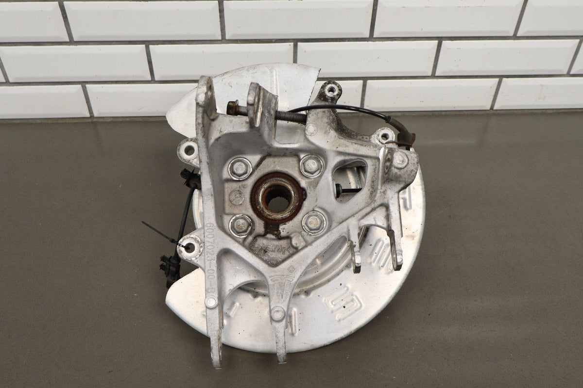 2012-20 Tesla Model S Left Rear Spindle Knuckle Hub ABS