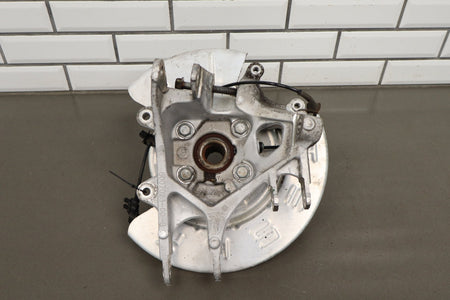 2012-20 Tesla Model S Left Rear Spindle Knuckle Hub ABS