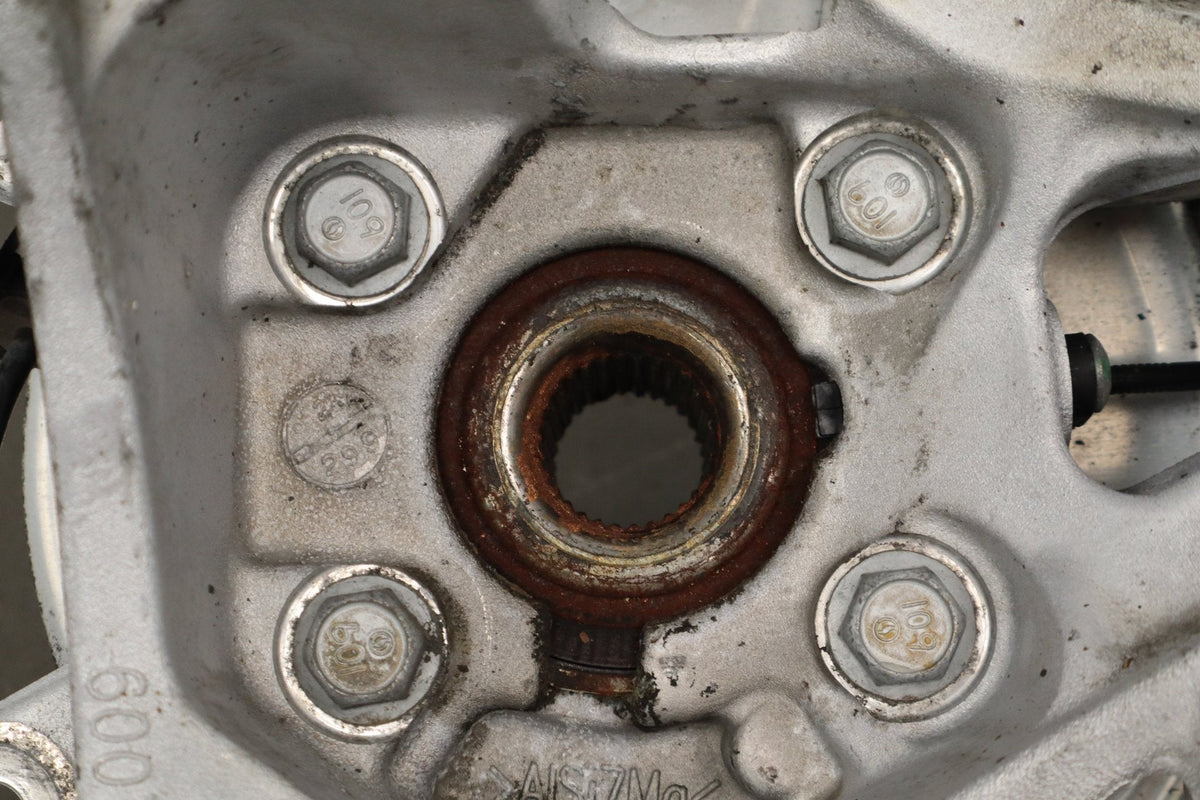2012-20 Tesla Model S Left Rear Spindle Knuckle Hub ABS