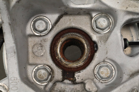 2012-20 Tesla Model S Left Rear Spindle Knuckle Hub ABS