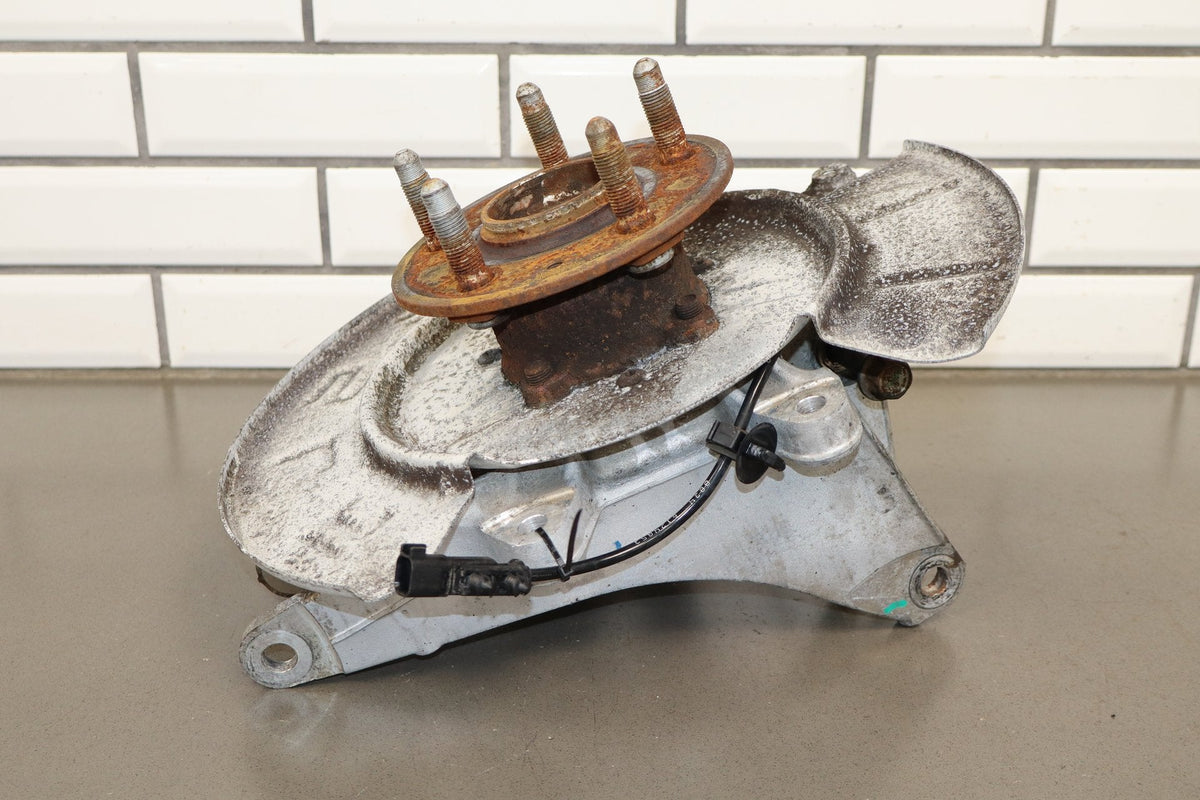 2012-20 Tesla Model S Left Rear Spindle Knuckle Hub ABS