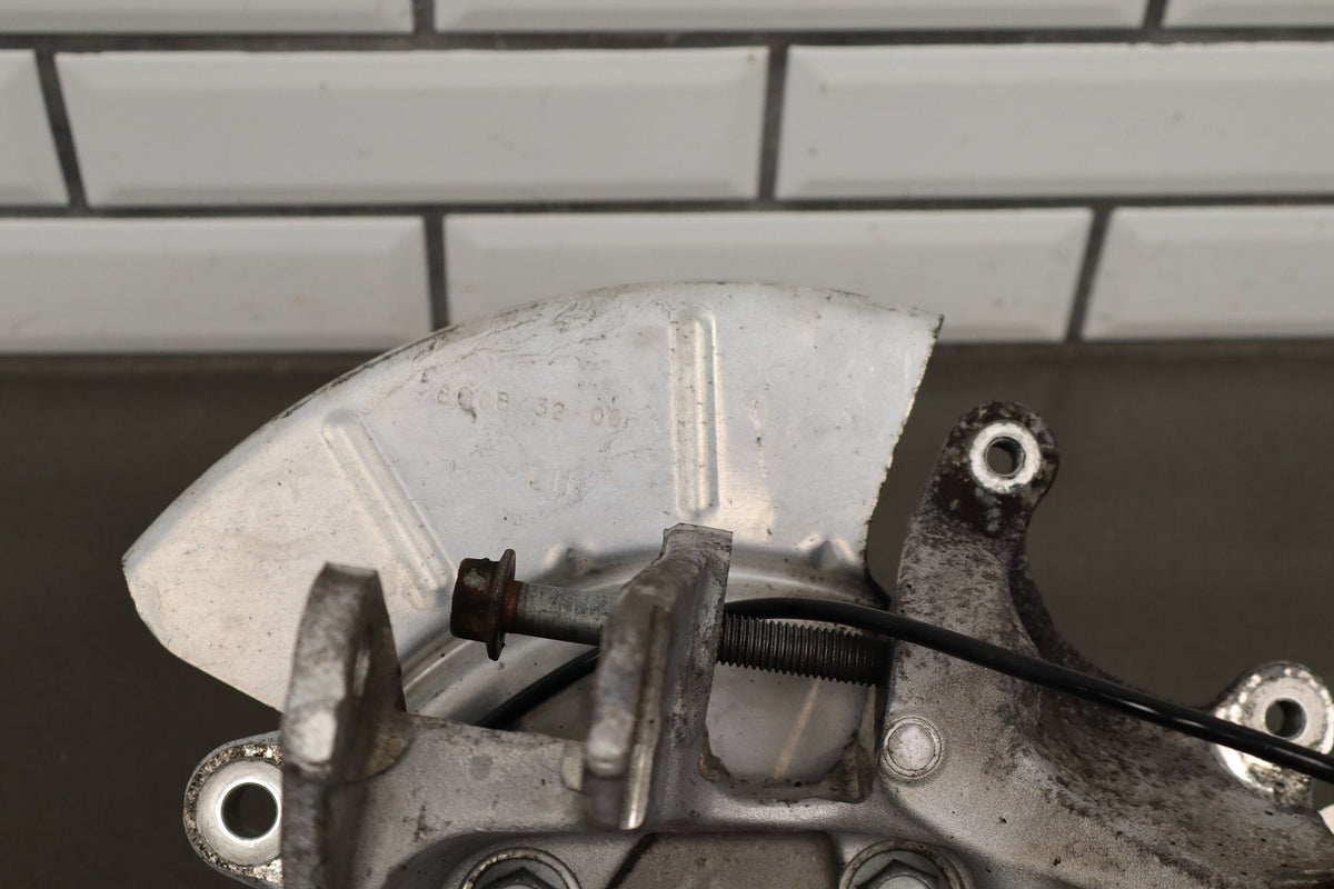 2012-20 Tesla Model S Left Rear Spindle Knuckle Hub ABS